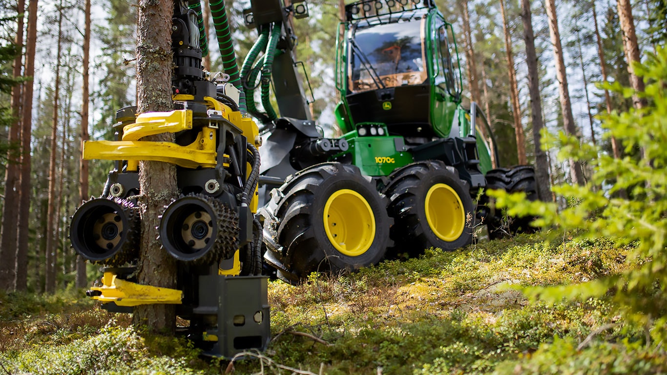 John Deere 1070G con H212