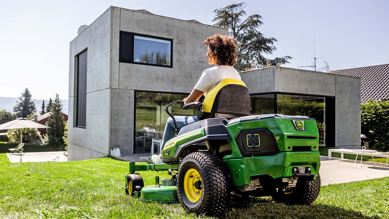 Equipo para césped con asiento